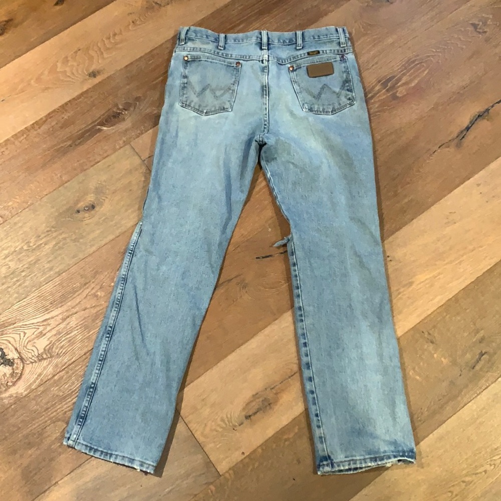 VINTAGE RIPPED WRANGLER JEANS